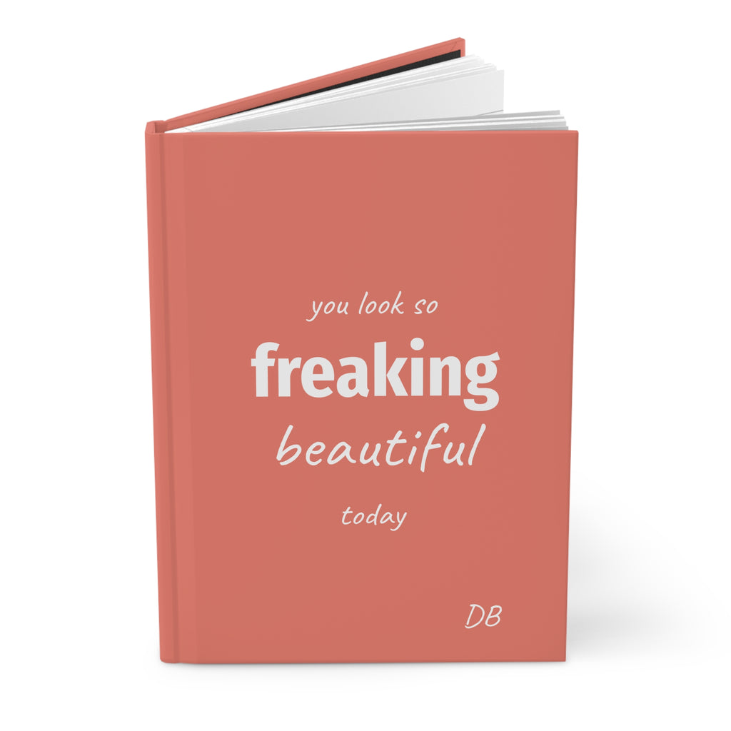 Coral Freaking Beautiful hardcover journal standing upright with white lettering