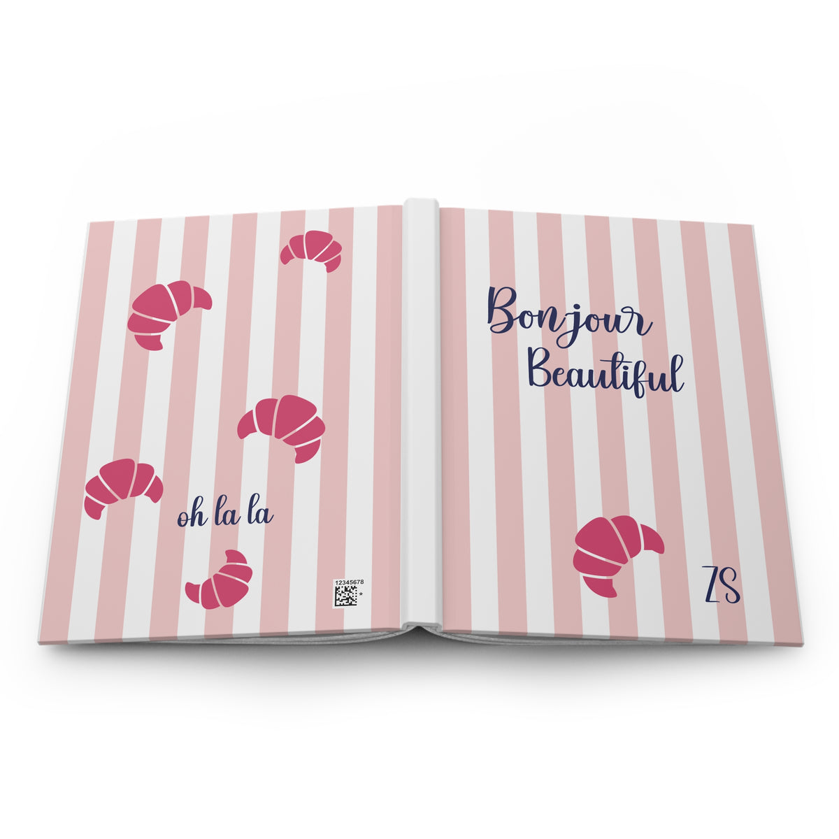 Full wraparound cover of the Bonjour Beautiful journal: croissants on the back, lettering and initials on the front
