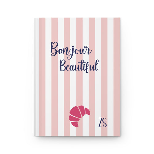 Bonjour Beautiful journal with pink and white stripes, black script lettering, a red croissant and custom initials