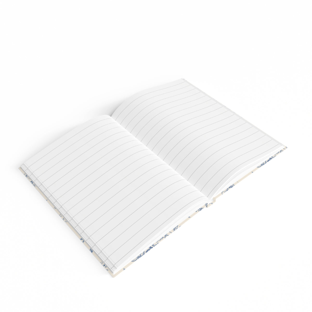 Toile de Jouy journal lying open, showing ruled pages and lay-flat casewrap binding