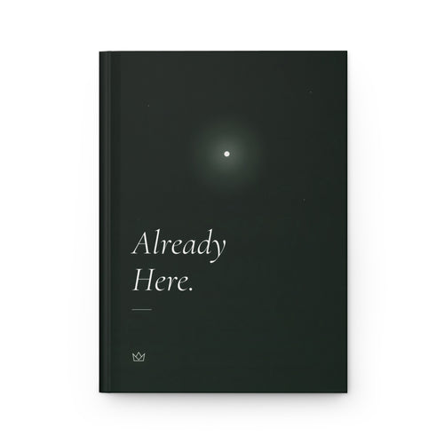 Front cover of the Already Here. manifestation journal: forest-green hardcover with a single glowing star and soft italic title