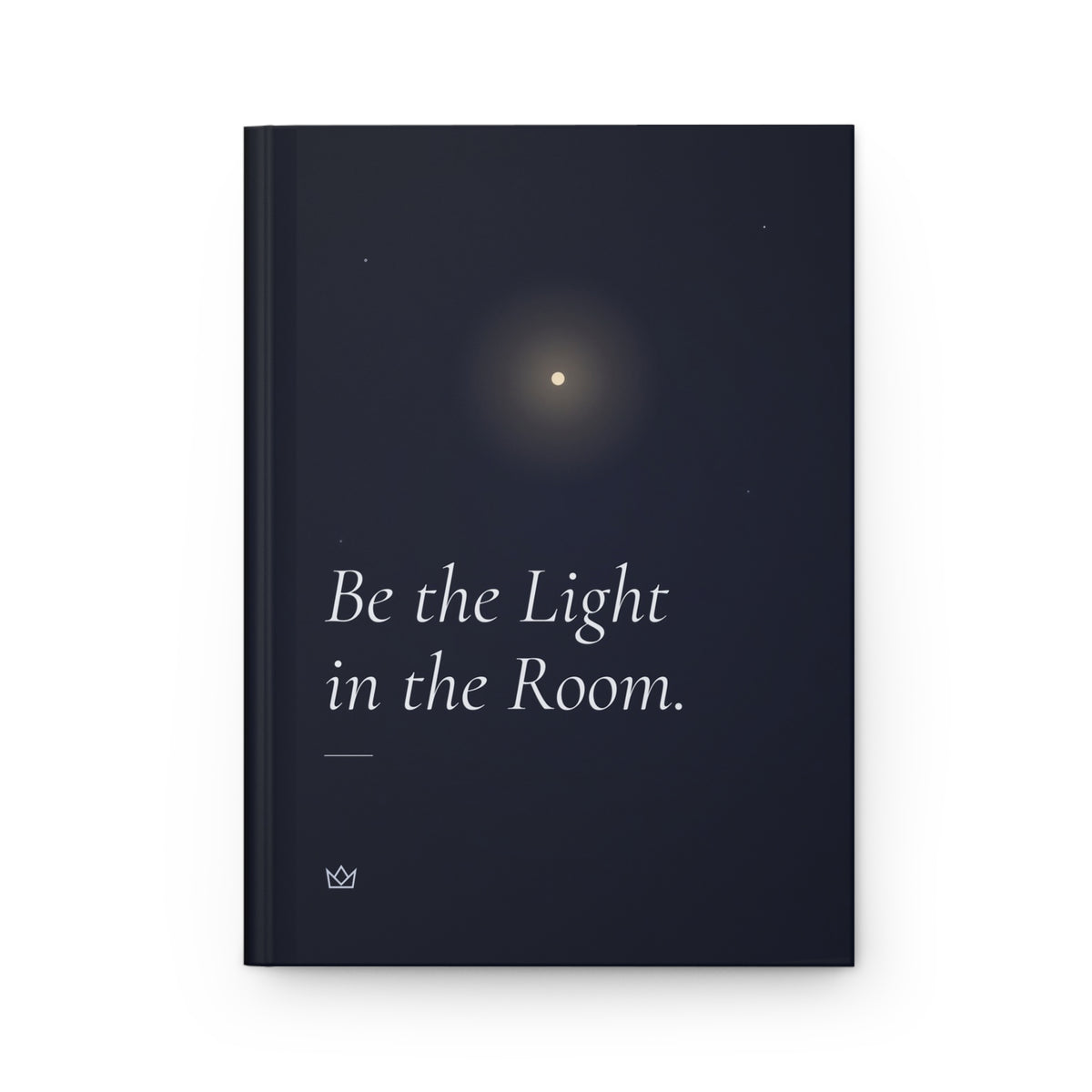 Front cover of the Be the Light in the Room. self reflection journal: night-blue hardcover with a single warm point of light and soft italic title