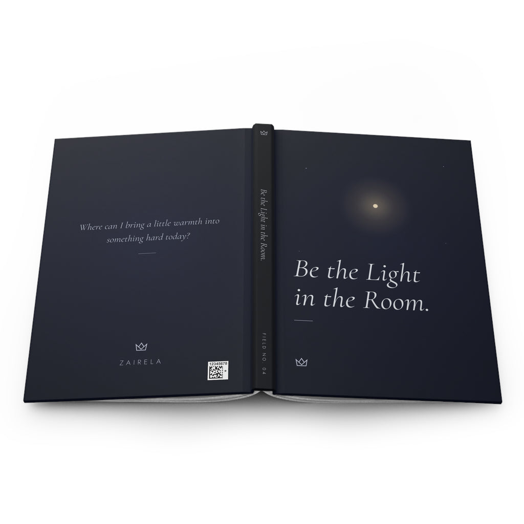 Be the Light in the Room journal laid open to show the full-wrap design across the back cover, spine and front cover