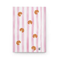 Custom initials hardcover journal open showing ruled pages — croissant design stationery gift