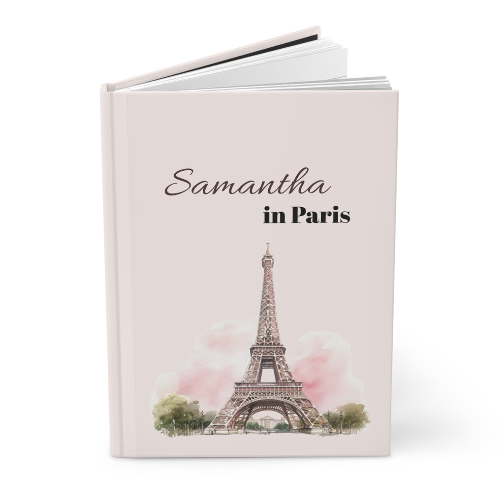 Paris personalized journal on a café table next to coffee — travel gift for her