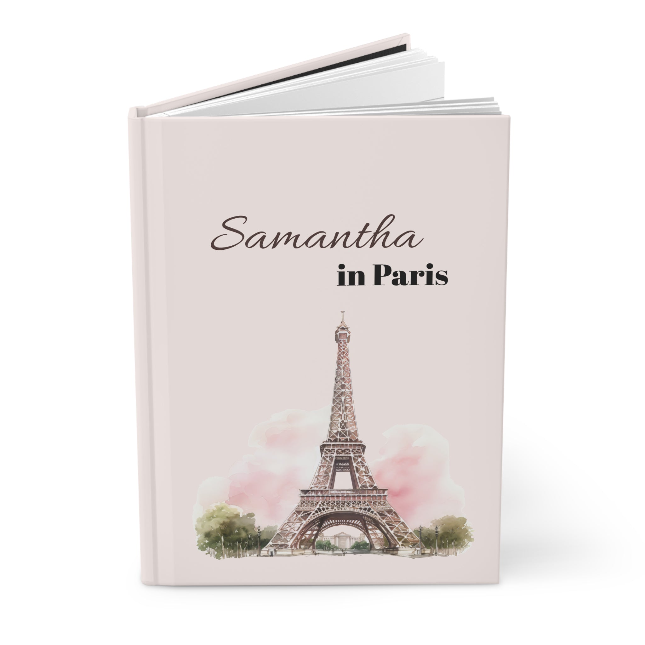 Paris personalized journal on a café table next to coffee — travel gift for her