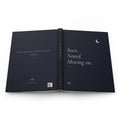 Seen. Noted. Moving on. journal laid open to show the full-wrap design across the back cover, spine and front cover