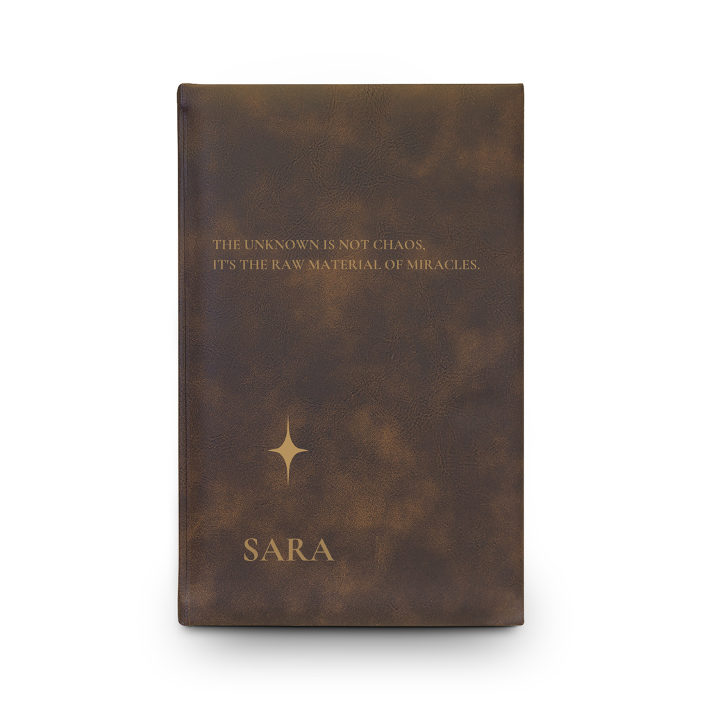 Personalized vegan leather journal shown for scale, a compact 5.25 x 8.25 inch notebook